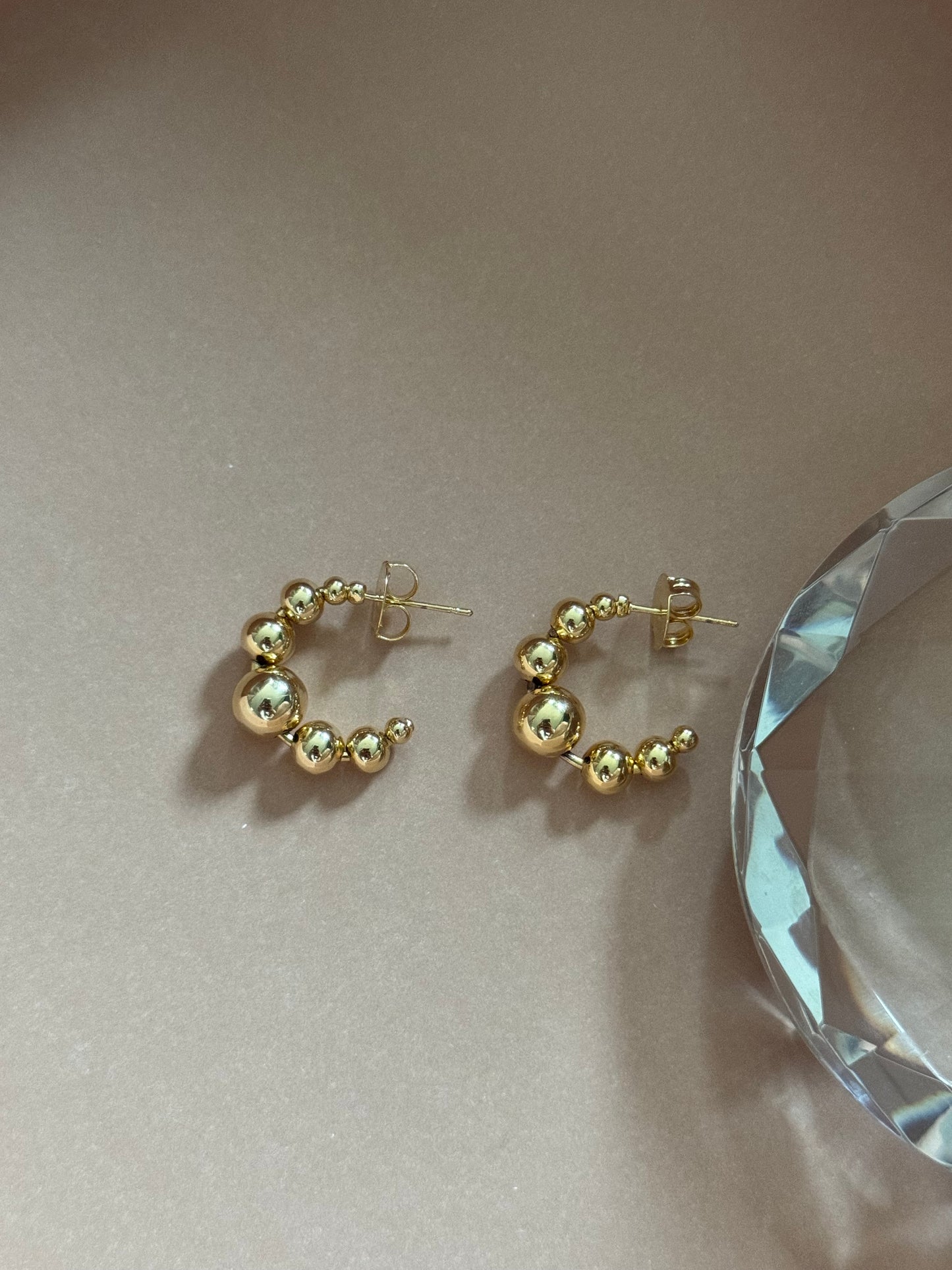 Hoop earrings with gold plated stacks, elegant.