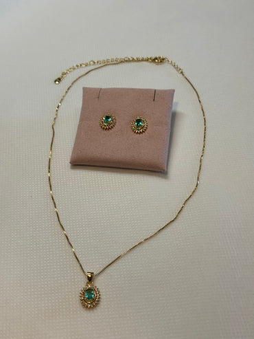 Set with earrings and delicate gold-plated necklace.