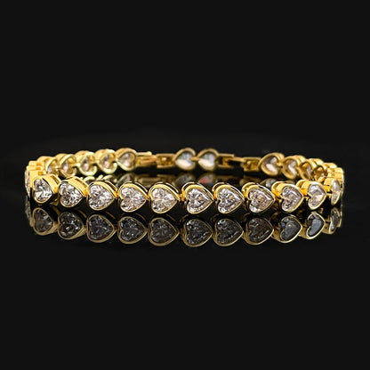 Bracelet avec pierres de zircone plaquées or.